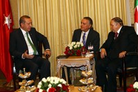 President Erdou011fan (L) speaks to Algerian President Abdelaziz Bouteflika (R) during his first visit to Algeria as president, Nov. 19-20, 2014.