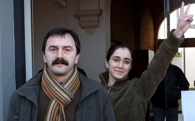 This file photo dated Jan. 27, 2006 shows Musa Au015fou011flu (L) walking next to Fehriye Erdal, a DHKP-C militant who took part in the notorious 1996 Sabancu0131 murder, while leaving the courthouse in Belgian city of Brugge.