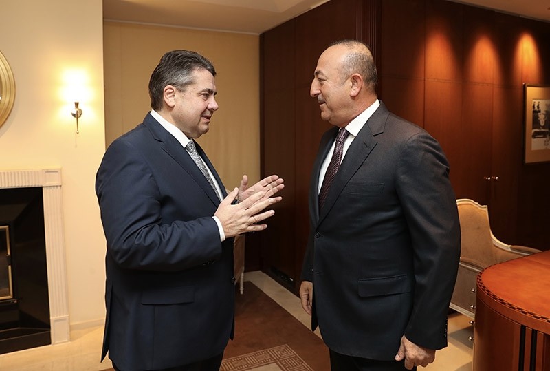 German Foreign Minister Sigmar Gabriel (L) met with his Turkish counterpart Mvlu00fct u00c7avuu015fou011flu in Adlon Hotel in Berlin, Germany, March 8, 2017. (AA Photo)