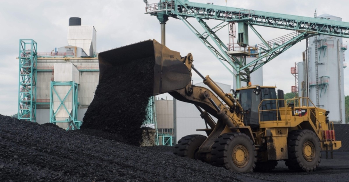 In this file photo taken on April 19, 2017 a front-end loader dumps coal at the East Kentucky Power Cooperative's John Sherman Cooper power station near Somerset, Kentucky. (AFP Photo)