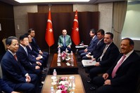 President Erdou011fan (C) met the executives of South Korean Hanwha Q-cellls during his two-day visit in the country, Seoul, May 3.