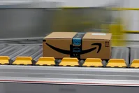 In this Feb. 9, 2018, file photo, a box for an Amazon prime customer moves through the new Amazon Fulfillment Center in Sacramento, Calif. (AP Photo)