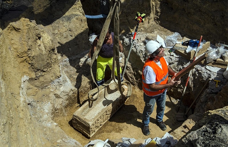 A handout photo made available by the Rome Press Office shows that two Roman sarcophagi have been found during work to place pipes near the Olympic Stadium, in Rome, 23 August 2017