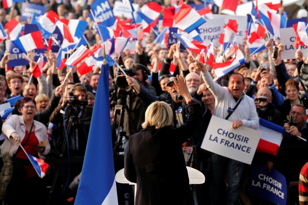 Marine Le Pen, an extremist far-right candidate for the 2017 French presidential election, attending a ,people's party, with supporters in Ennemain, northern France, May 4.