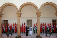 President Recep Tayyip Erdou011fan (L) shaking hands with India's Prime Minister Narendra Modi during a photo opportunity ahead of their meeting at Hyderabad House in New Delhi, India, Monday.