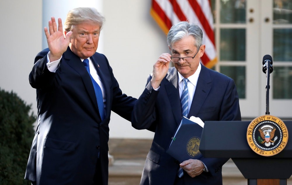 U.S. President Trump (L) gestures with Jerome Powell, his nominee to become chair of the U.S. Federal Reserve, at the White House, Washington, Nov. 3.