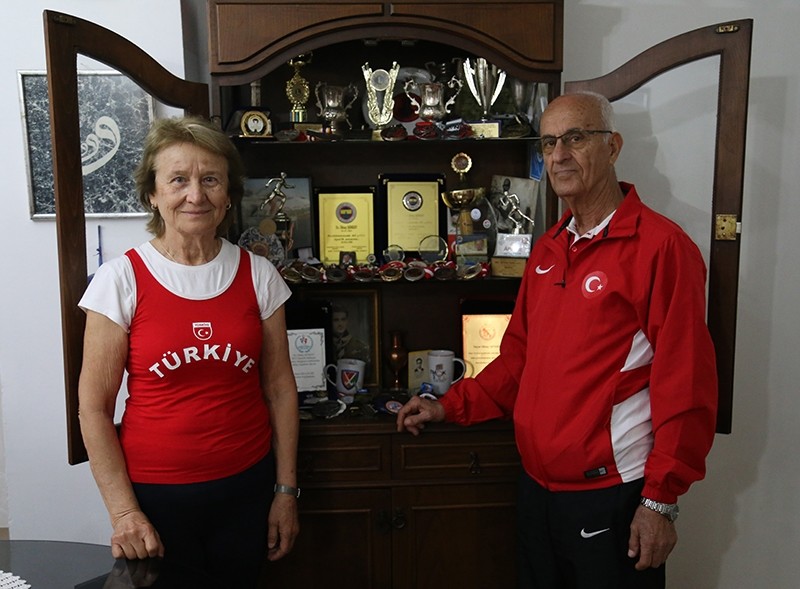 Their home is decorated with medals from wins around the world.