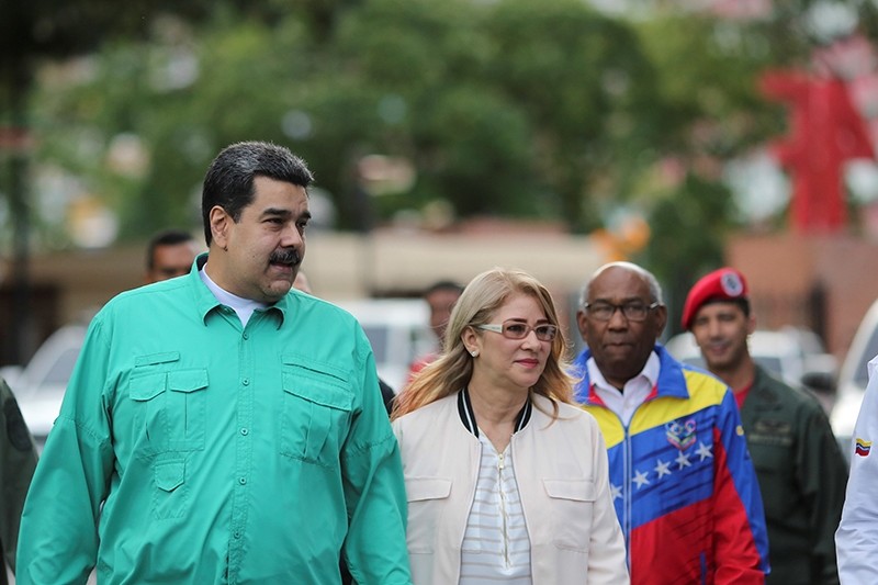 Venezuela's President Nicolas Maduro attends an event to hand over residences built under a government housing programme, with his wife Cilia Flores, in Caracas, Venezuela Nov. 15, 2018. (Reuters Photo)