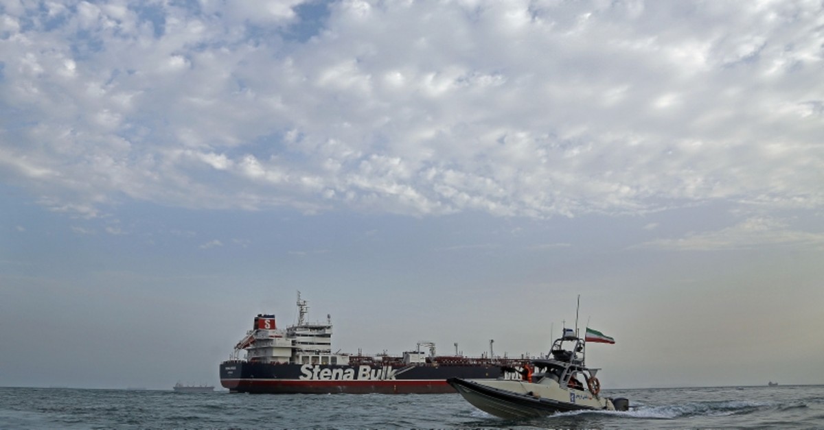A picture taken on July 21, 2019, shows Iranian Revolutionary Guards patrolling around the British-flagged tanker Stena Impero as it's anchored off the Iranian port city of Bandar Abbas. (AFP Photo)