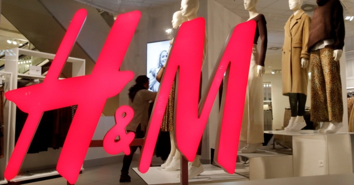 The logo of H&M is seen in a display window of a store in Zurich, Switzerland January 7, 2019. (Reuters Photo)