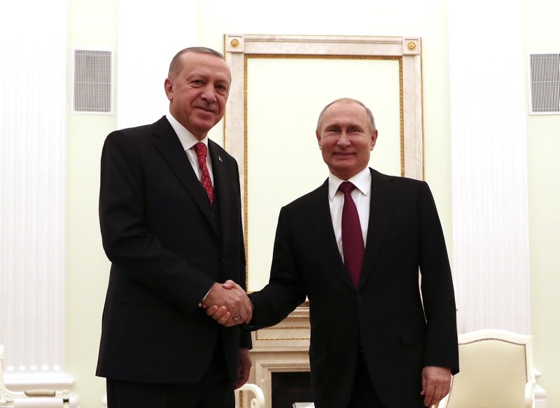 President Recep Tayyip Erdou011fan, left, and Russian President Vladimir Putin shake hands after their meeting in the Kremlin in Moscow, Russia, Wednesday, Jan. 23, 2019. (AA Photo)