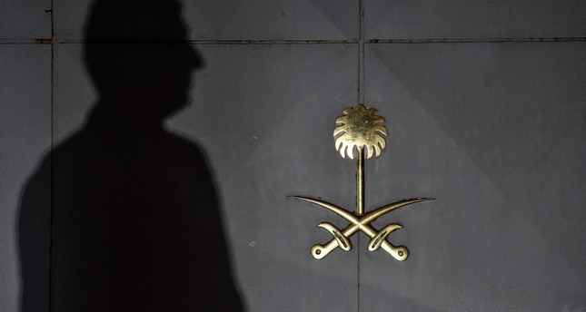 Security members of the consulate wait in front of the gate door of the Saudi Arabian consulate on October 17, 2018 in Istanbul. (AFP Photo)