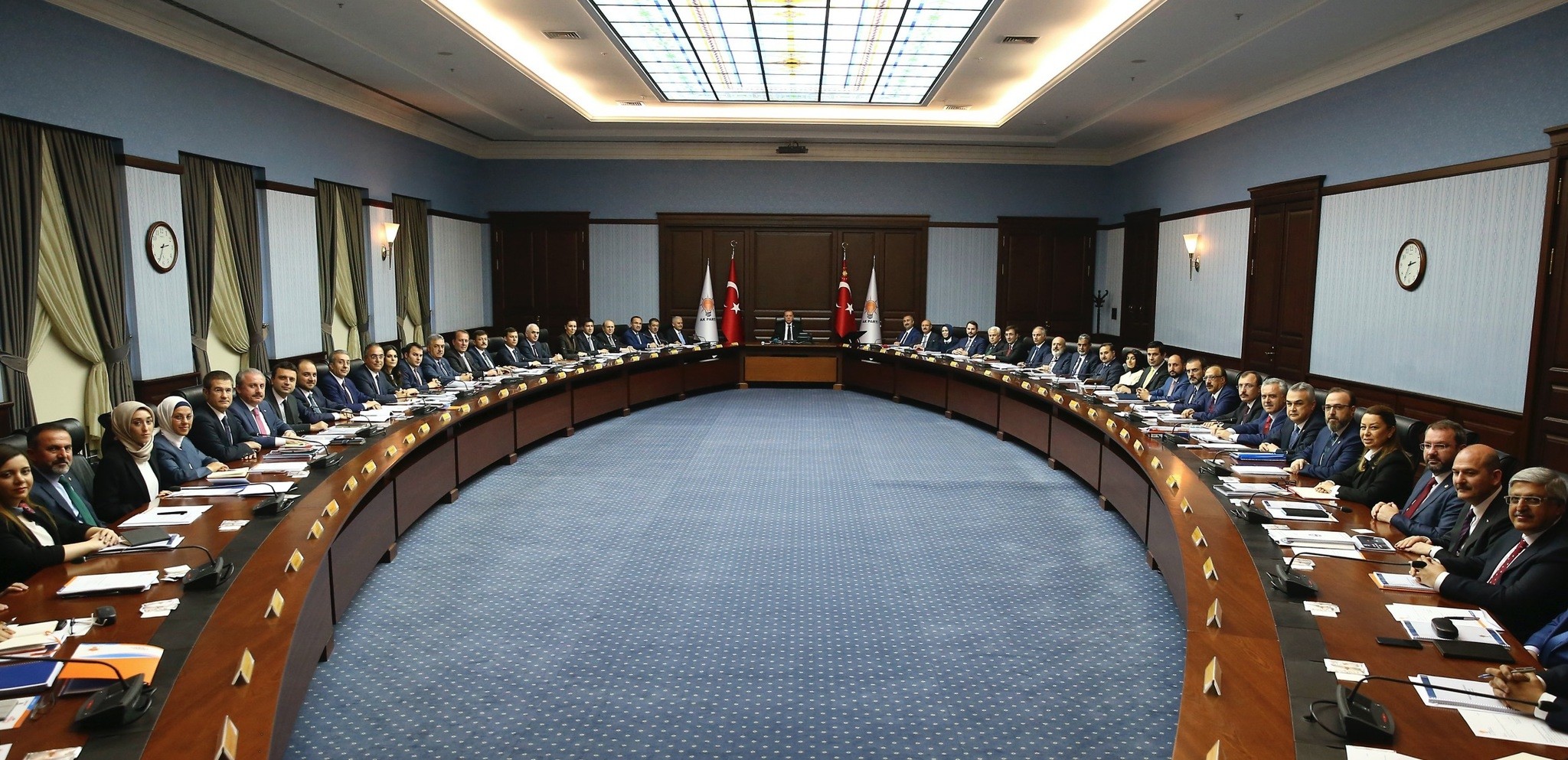 President Recep Tayyip Erdou011fan (C) chairs the first meeting of the ruling AK Party's executive members, a week after being elected as the party chairman, Ankara, May 29.