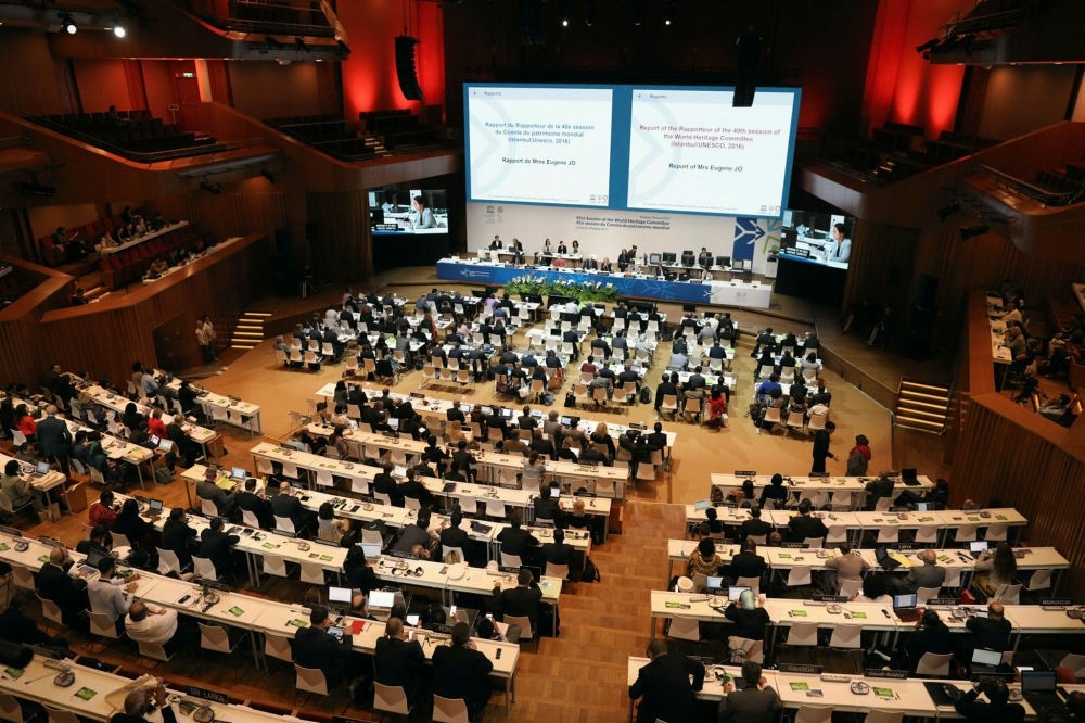 Attendees sit during the opening of the 41st session of the United Nations Educational, Scientific and Cultural Organization (UNESCO) World Heritage Committee at the ICE Krakow Congress Centre in Krakow, Poland, July 3.