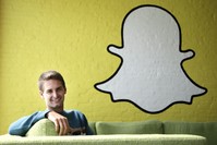 Snapchat CEO Evan Spiegel poses for a photo in Los Angeles. Owner of the ephemeral message service Snapchat, seeks to raise up to $3 billion in an initial public offering.