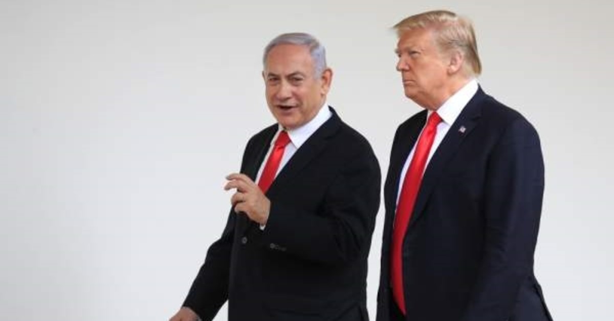 The U.S. President Donald Trump and Israeli Prime Minister Benjamin Netanyahu walk along the Colonnade of the White House, Washington, D.C., March 25, 2019. (AP Photo)