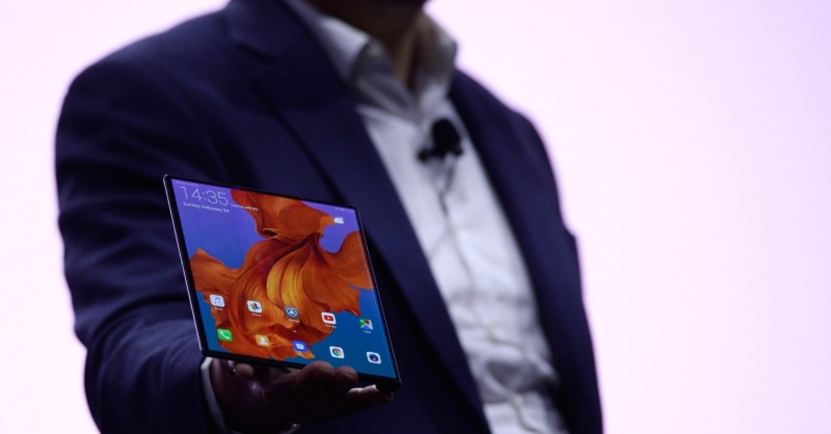 Richard Yu, the CEO of Huawei's consumer products division presents the new HUAWEI Mate X foldable smartphone at the Mobile World Congress (MWC), on February 24, 2019 in Barcelona. (AFP Photo)