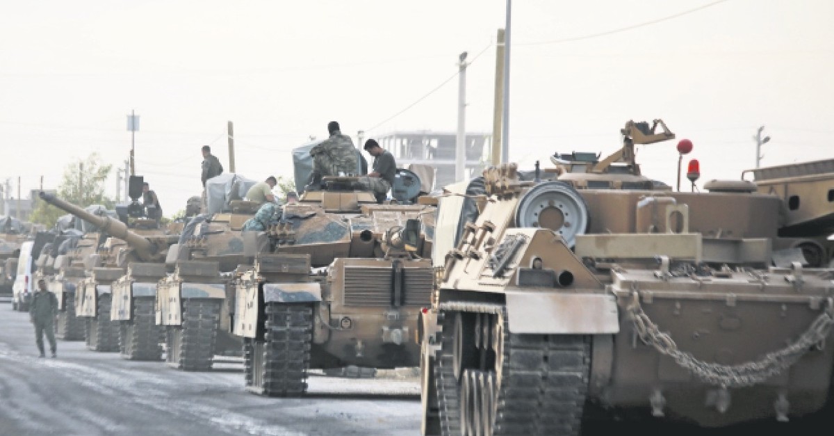 Turkish military vehicles lined up near Aku00e7akale district along the border with Syria as part of Operation Peace Spring against the PKK-linked Peopleu2019s Protection Units (YPG) terrorist elements, Oct. 11, 2019.