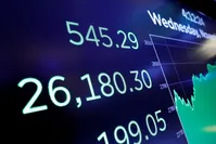 A board above the floor of the New York Stock Exchange shows the closing number for the Dow Jones industrial average, Wednesday, Nov. 7, 2018. (AP Photo)
