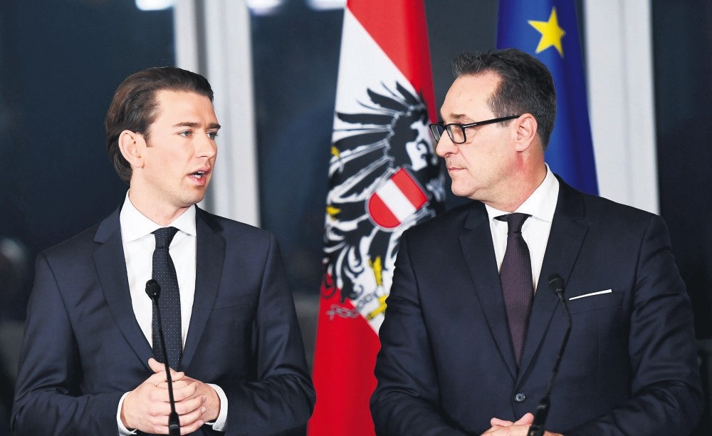 Austrian foreign minister and the leader of the Austrian Peoples Party Sebastian Kurz (L) and the head of the right-wing Austrian Freedom Party Heinz-Christian Strache attend a news conference at Kahlenberg hill in Vienna, Austria, Dec. 16. 