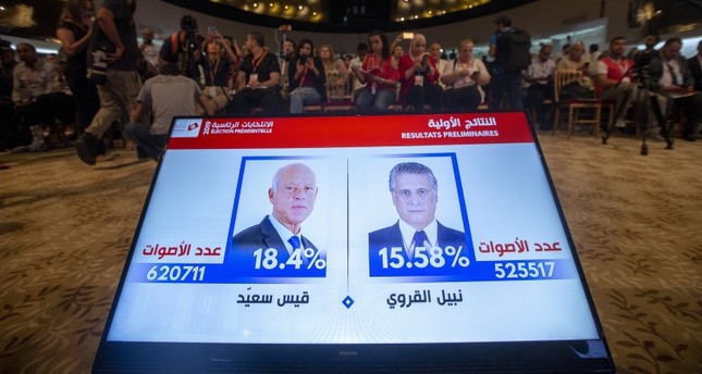 أستاذ قانون وقطب إعلامي مسجون يترشحان لإعادة انتخابات الرئاسة التونسية