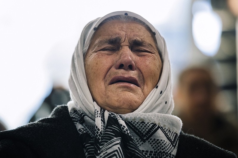 A victim's relative reacts as she watches a live TV broadcast of U.N. judges announcing the life sentence in the trial of former Bosnian Serbian commander Ratko Mladic, Potocari, Bosnia and Herzegovina, Nov. 22, 2017. (AFP Photo)