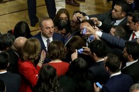 Foreign Minister Mevlu00fct u00c7avuu015fou011flu answers the questions of journalists during a reception held for the 99th anniversary of the foundation of the Turkish Grand National Assembly (TGNA), Ankara, April 23, 2019.