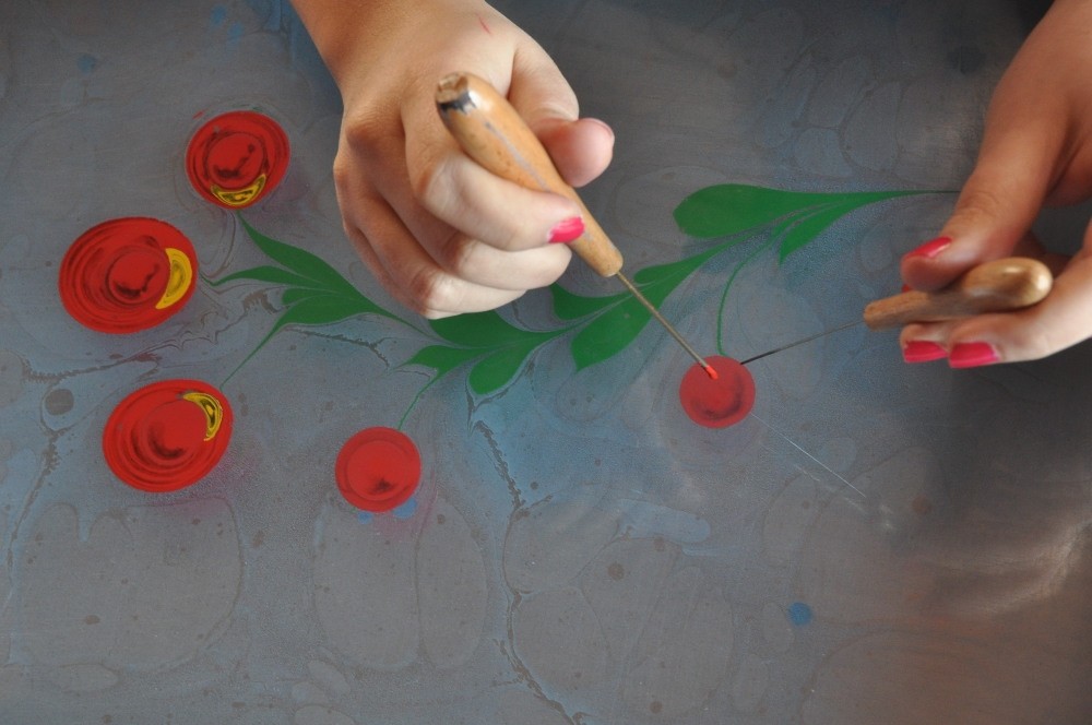The students take courses in marbling, a UNESCO intangible world heritage.