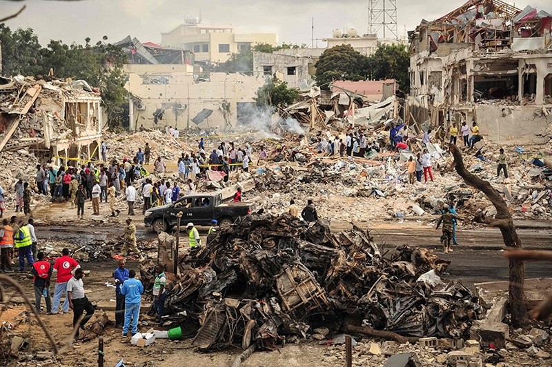 A picture taken on Oct. 15, 2017, shows a general view of the scene of the explosion of a truck bomb in the center of Mogadishu. (AFP Photo)