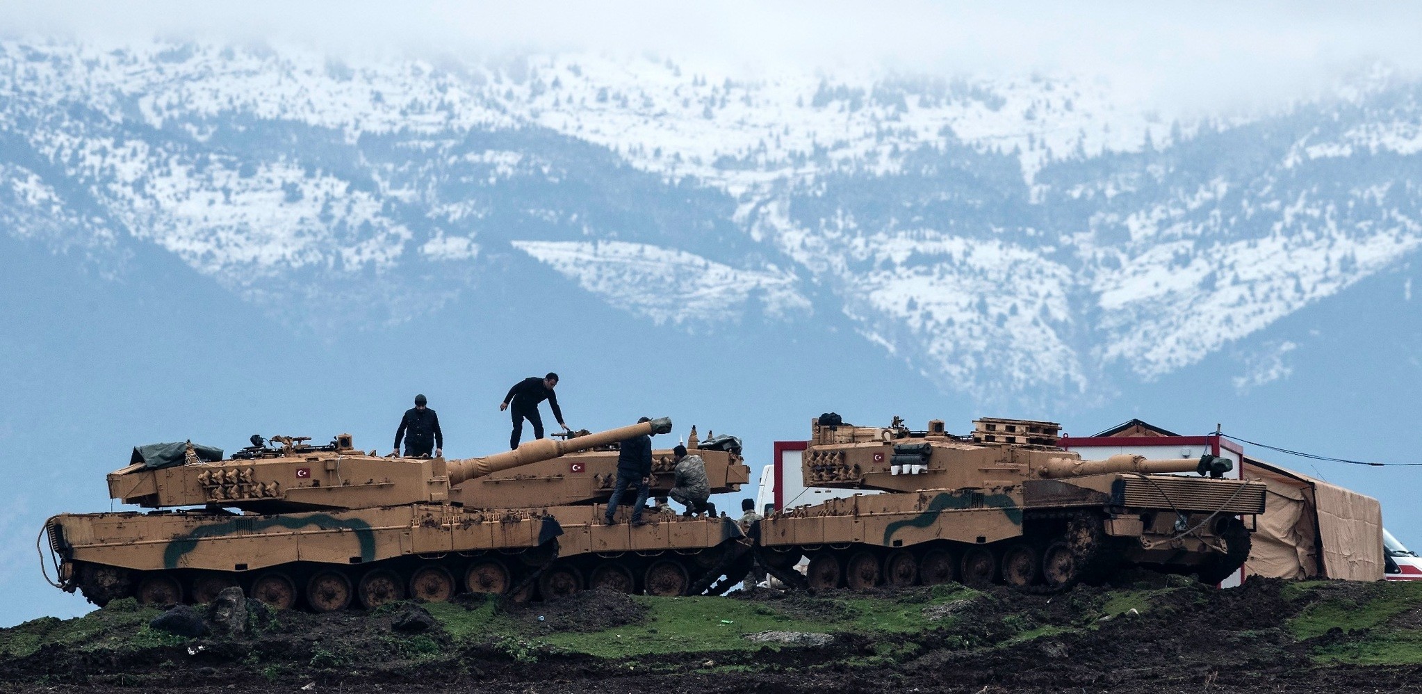 Turkish  soldiers train with tanks and armored  vehicles near the  Syrian-Turkish border in Hatay ahead of Operation Olive Branch, Jan. 24.