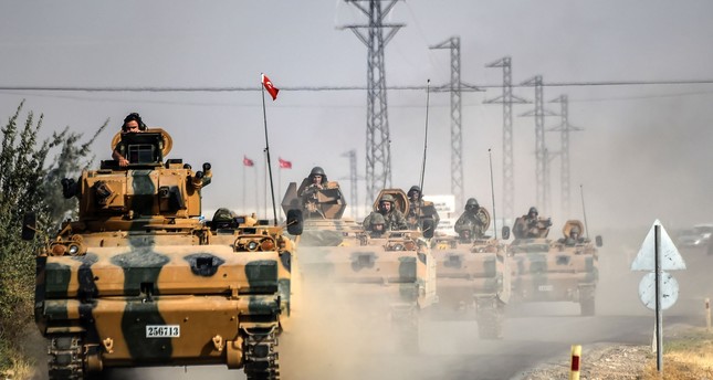 Turkish Army tanks drive to the Syrian Turkish border town of Jarablus as part of counterterror operations against Daesh and PKK-affiliated terrorist groups, Aug. 25, 2016.
