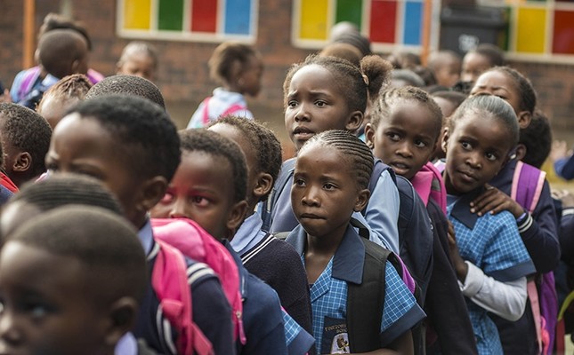 African students line up in front of their classrooms. (File Photo)