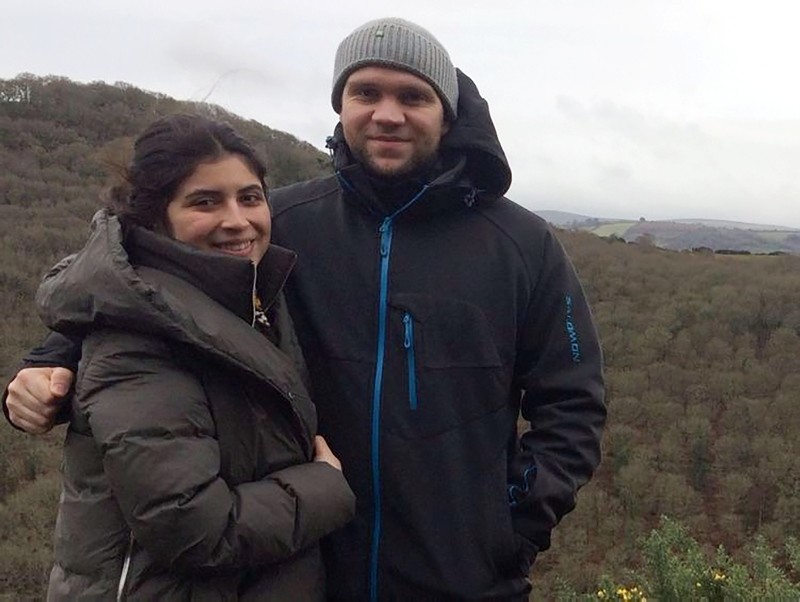 A handout picture released by the family of Matthew Hedges on October 11, 2018 shows British student Matthew Hedges (R) and his wife Daniela Tejada (L) posing in an undisclosed location. (AFP Photo/ Detained In Dubai)