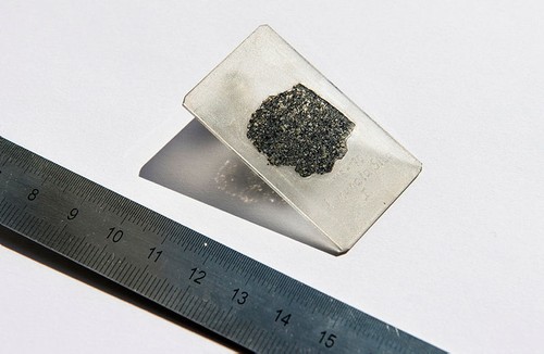 Photo provided by Hillary Sanctuary of EPFL shows a thin slice of the meteorite sample from a meteorite that fell to Earth more than a decade ago. (AP Photo)