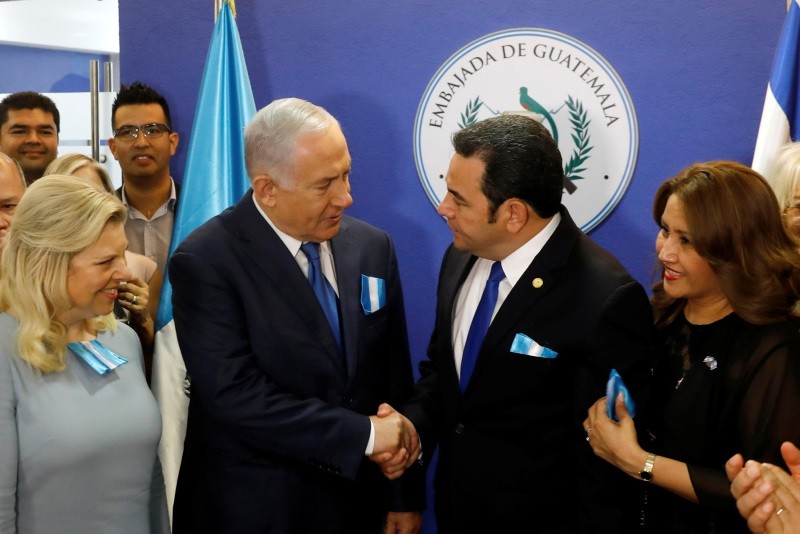 Israel Prime Minister Benjamin Netanyahu, center left, and Guatemala President Jimmy Morales shake hands (AP Photo)