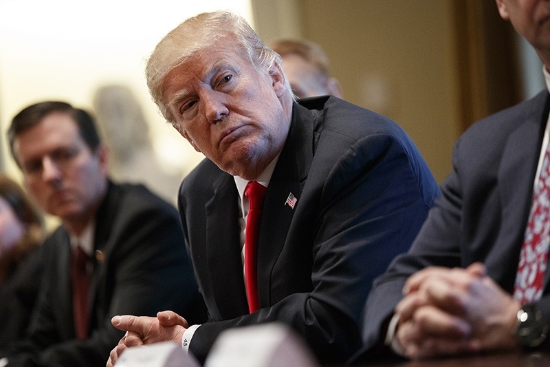 President Donald Trump listens during a meeting with steel and aluminum executives in the Cabinet Room of the White House, Thursday, March 1, 2018, in Washington. (AP Photo)