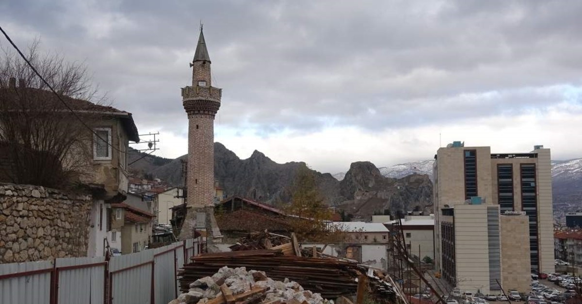 A mosque in northern Turkey's Tokat province undergoing a third restoration while its 15th century minaret has survived several disasters without damage. (IHA Photo)