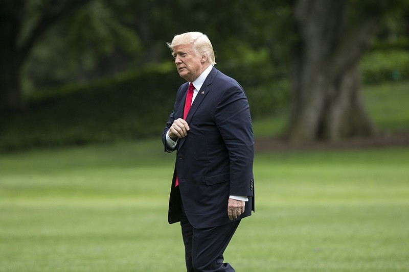 US President Donald J. Trump walks on the South Lawn of the White House after returning by Marine One, in Washington, DC, USA, 16 June 2017. (EPA Photo)