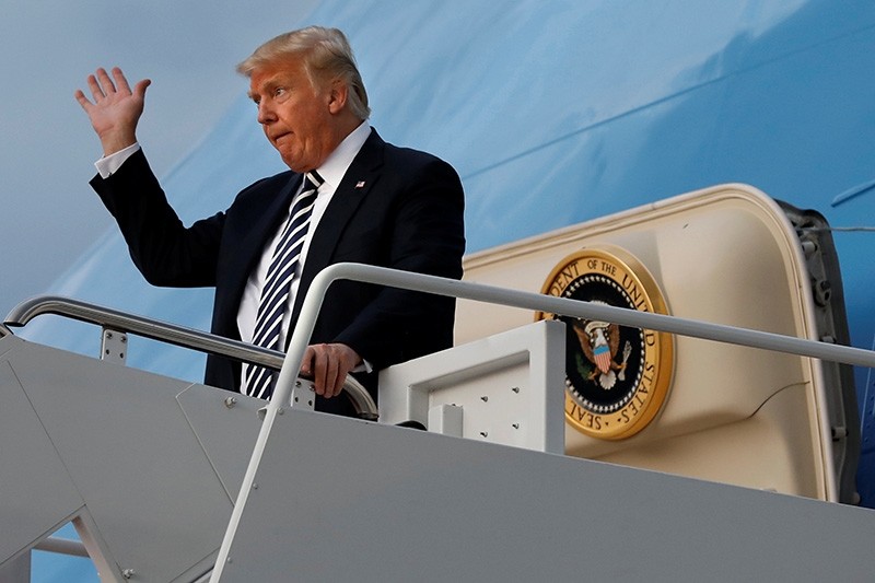 U.S. President Donald Trump waves at Joint Base Andrews in Maryland, U.S., after his return to Washington from Charlotte, North Carolina, Aug. 31, 2018. (Reuters Photo)
