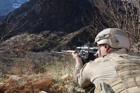 A soldier in Operation Ku0131ran, which is taking place in Hakkari province against PKK terrorists, takes aim at a potential target in this undated photo. (Gendarmerie Command via AA)