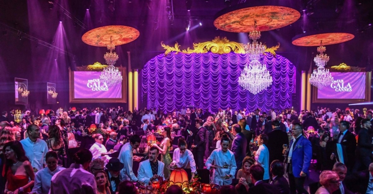 A general view shows people attending on May 23, 2019 the amfAR 26th Annual Cinema Against AIDS (AFP Photo)