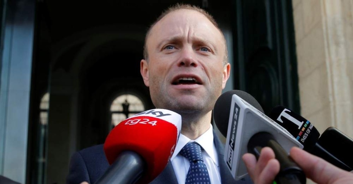 Malta's Prime Minister Joseph Muscat talks to the media as he arrives at his office at Auberge de Castille, Valletta, Dec. 2, 2019. (Reuters Photo)